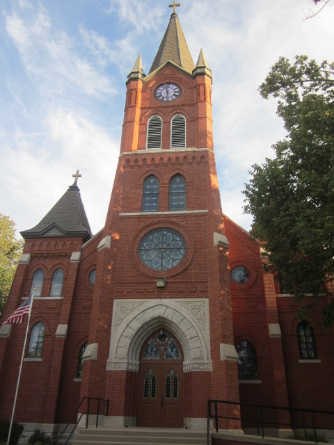 old brick Catholic church with decorative steeply