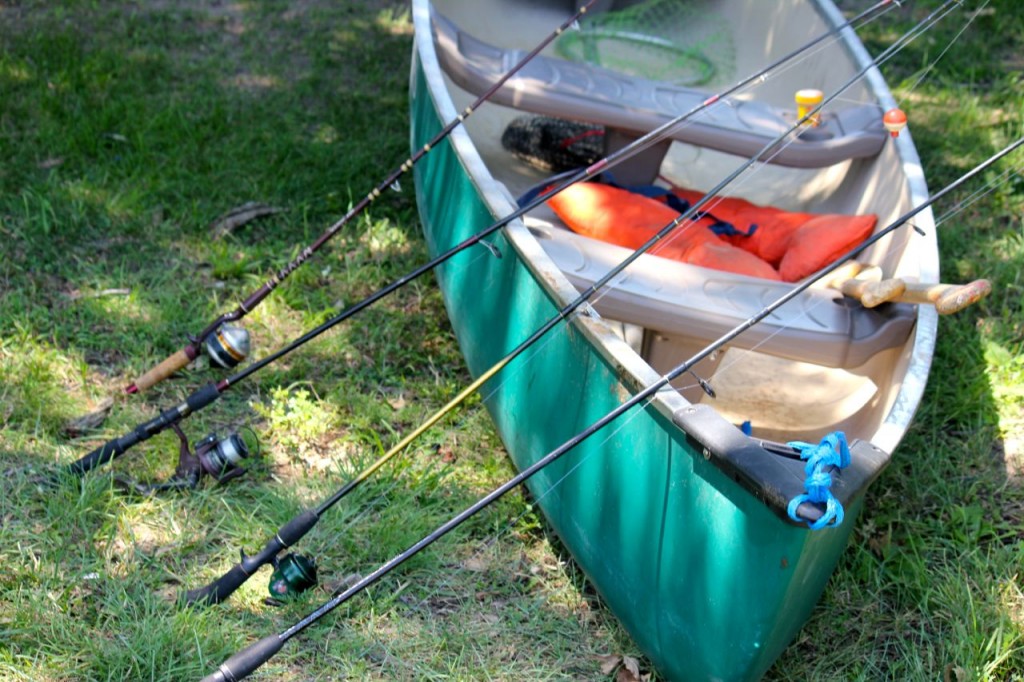 Rods and canoe all ready for catching a load of fish. Only. We only caught one. Well done, Bethie.