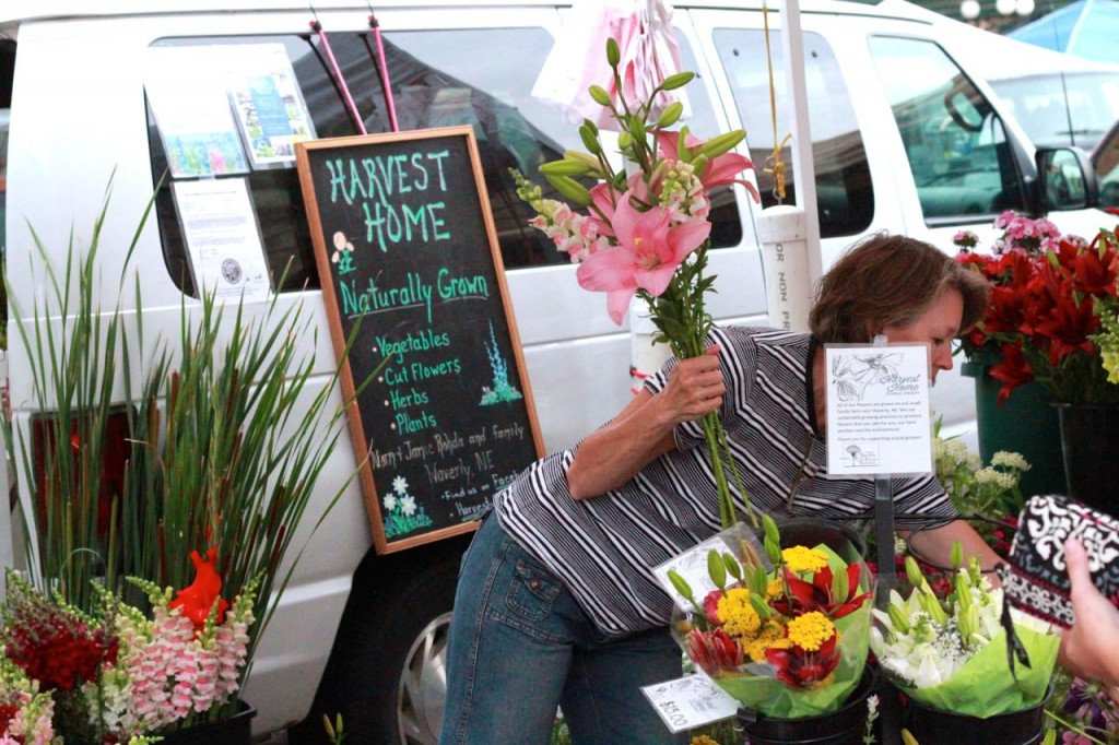 Here I am, pretending to be working on a bouquet, but actually trying to hide behind this little sign. It didn't work.