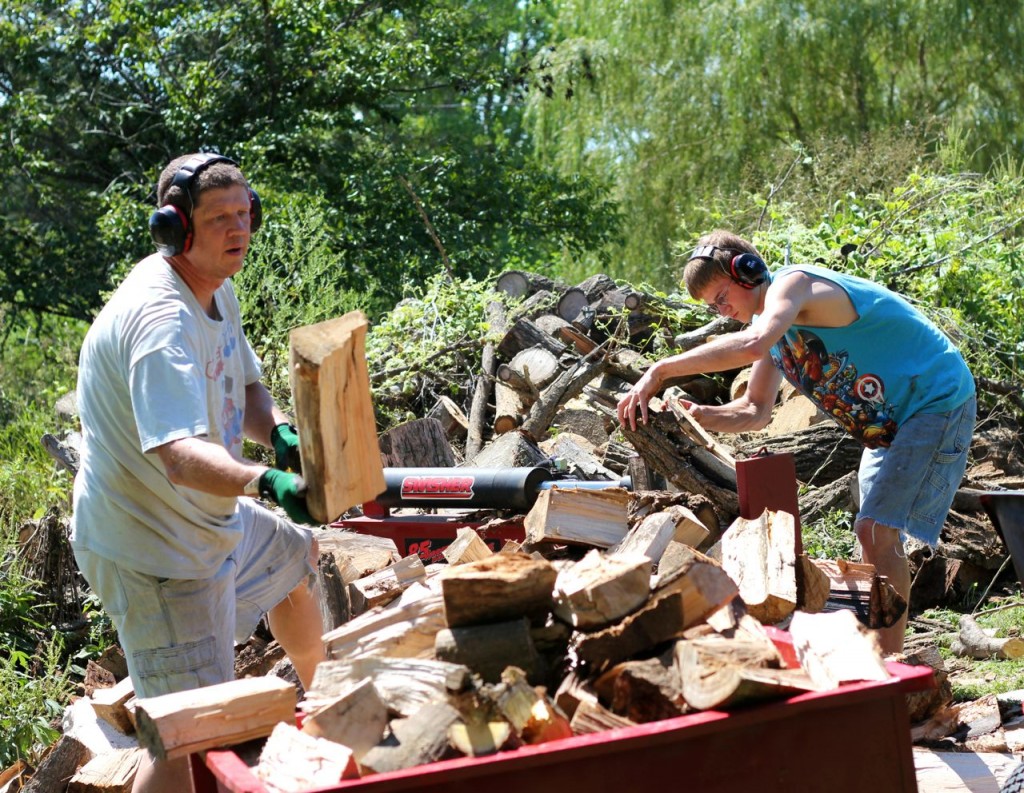 Here Timothy and Bryan work up a few of the sailor logs.