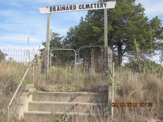 old cemetary with sign "Brainard Cemetery"