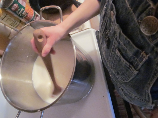 Here my little boy stirs the milk, which gets hotter and hotter . . .