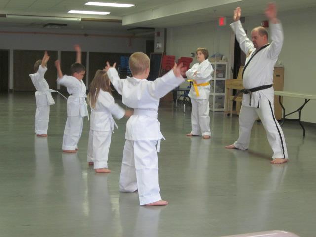 I chuckle the entire time I watch little Mack's class.  Something about all those grinning little faces and the flailing about of their little limbs.