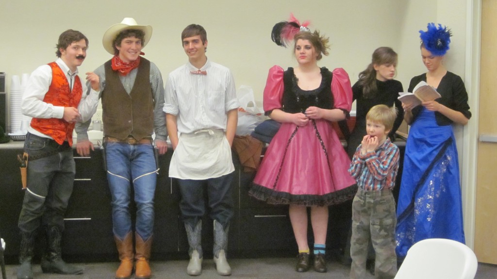 Here's a line-up of actors waiting to go onstage during rehearsal, and little Mack.
