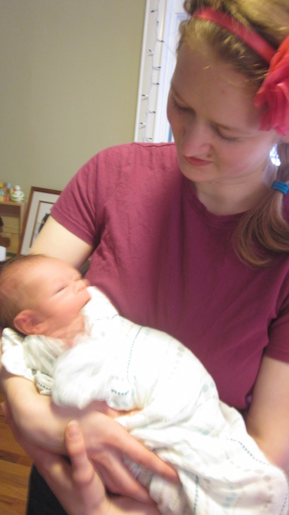 Aunt Bethie admires the cutest baby in the room.