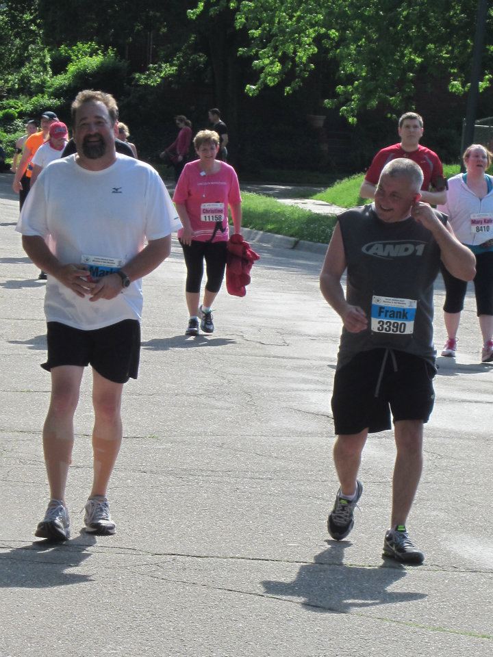 Here's my brother Mark running in the half-marathon.  He's the one on the left, with the cute legs.
