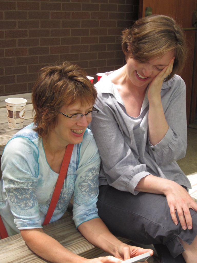 I love this photo of my beautiful sisters giggling over something funny.