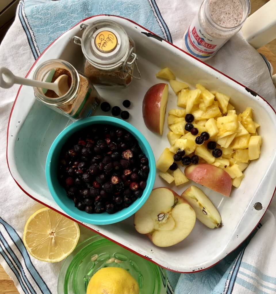 ingredients of aronia berry chutney on a tray