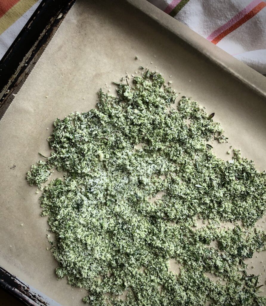 herby garlic salt on parchment paper