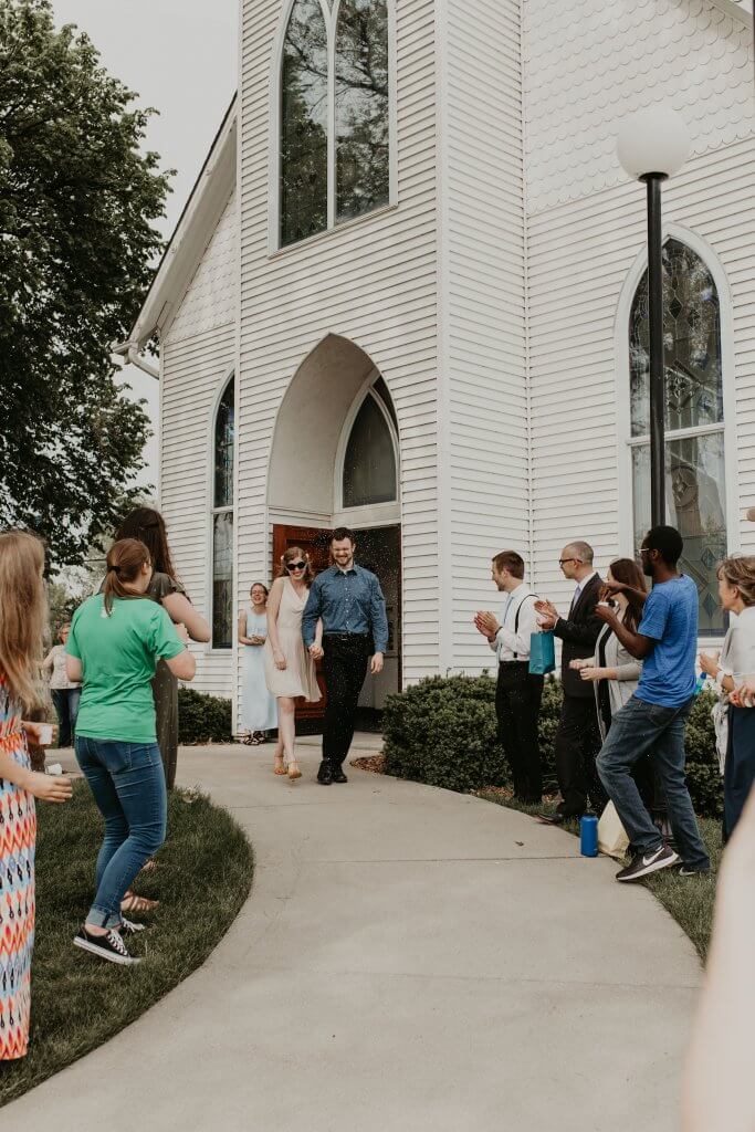 bride and groom leaving chapel