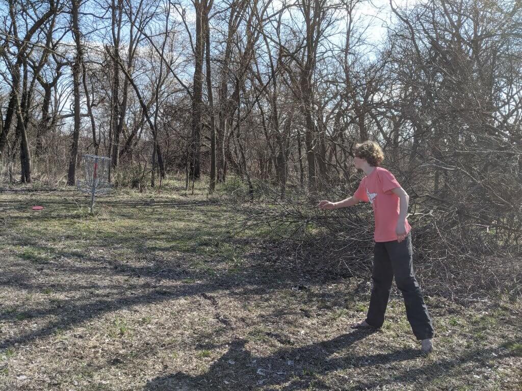 boy throwing disk