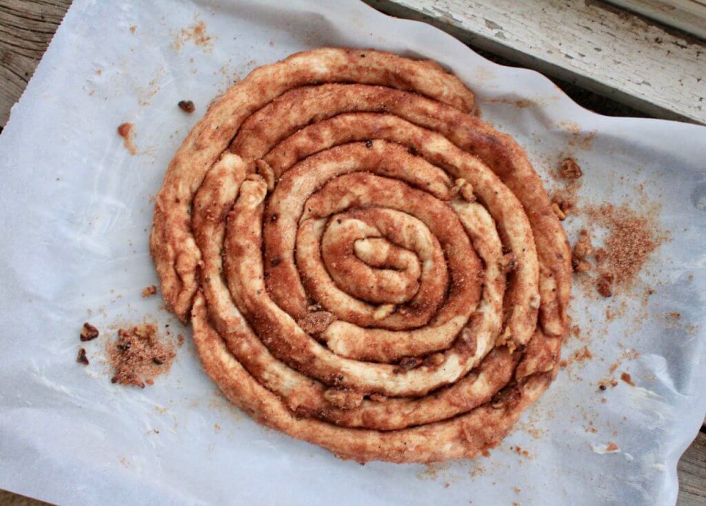 cinnamony-sugar-dipped dough ropes, arranged in a spiral