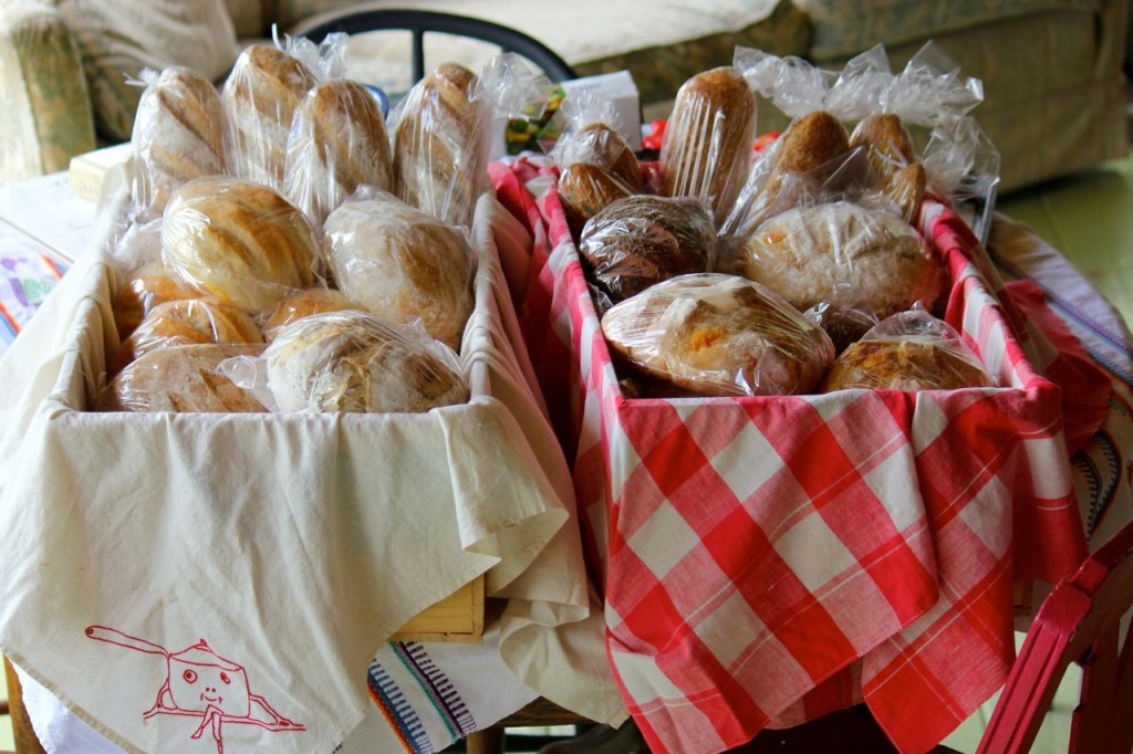 Here are my bread boxes, packed and ready for farmer's market. See the embroidery on the towel on the left? Cute, huh?