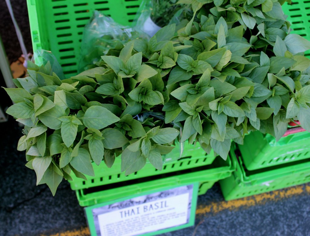 Bunches of Thai basil, nearly sold out.