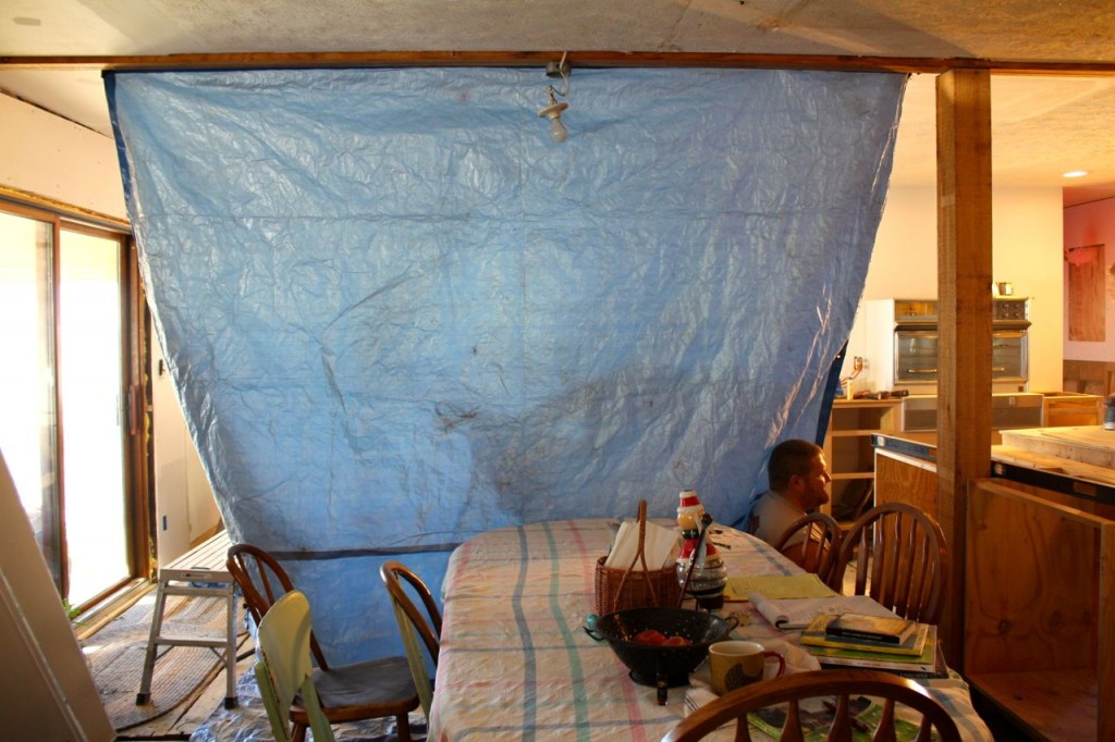 Reubsy put up this tarp ostensibly to keep the dust out of our living area, but I think it's really just because he wanted a bit of privacy.
